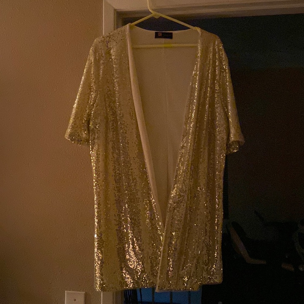 This jacket was bought for a 50th wedding anniversay and only worn once